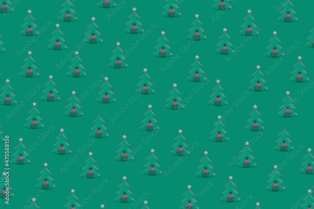 Creative flat layout with plastic transparent glitter Christmas tree with white ornament inside of it with wooden star on top. Aquamarine patterned New Year party background. Creative flat layout with plastic transparent glitter Christmas tree with white ornament inside of it with wooden star on top. Aquamarine patterned New Year party background.