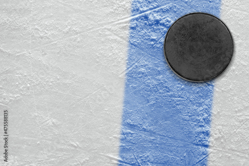 Ice hockey puck with blue line