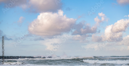 Crushing ocean waves. Scenic sky and tranquil beach line