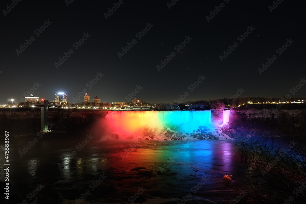 American Falls, Bridal Veil Falls, Niagara Falls at night, with light pointing at it