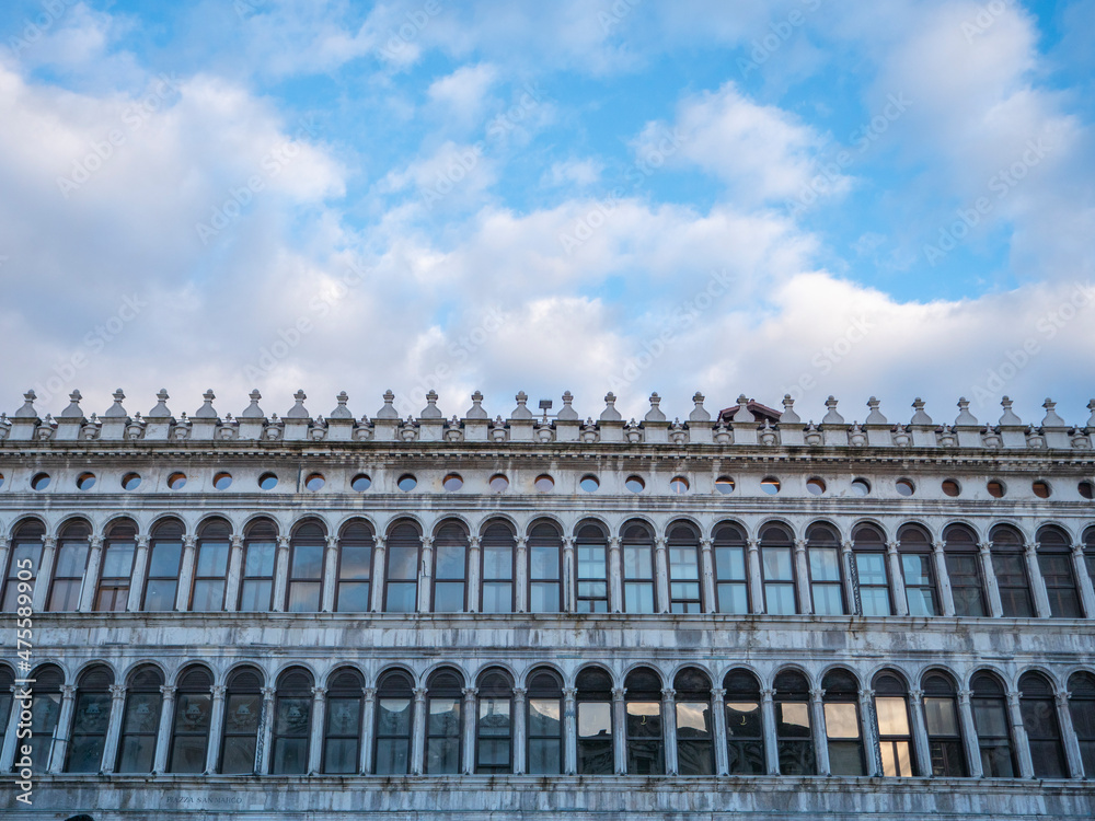 Procuratie vecchie, facade of the famous palace landmark in Piazza San Marco, Venice, Italy