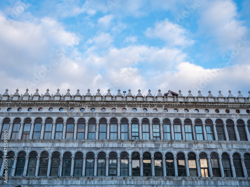 Procuratie vecchie, facade of the famous palace landmark in Piazza San Marco, Venice, Italy