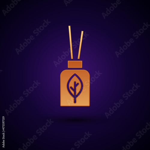 Gold Aroma diffuser icon isolated on black background. Glass jar different with wooden aroma sticks. Vector