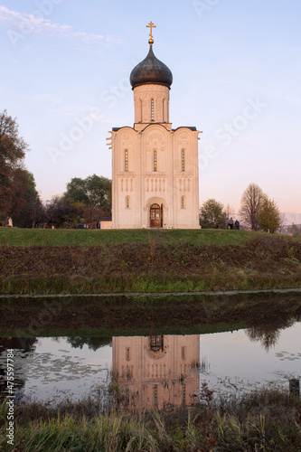 Church of the Intercession on the Nerl. General plan of the facade of the church. Shot in sunset light in the fall