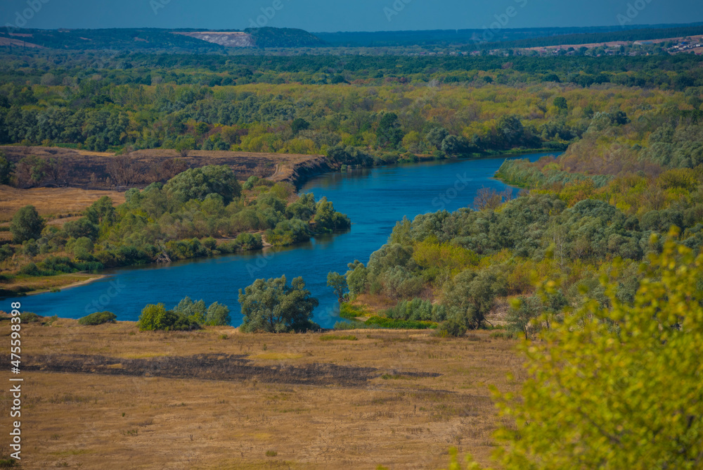 summer landscape, field and bend of the  river