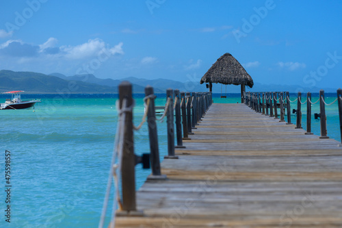 Aquatic dock on dominican lagoon. Copy space, wide angel © ALEKSEI