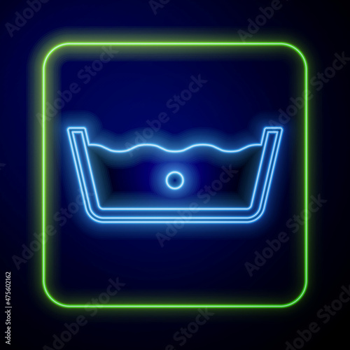 Glowing neon Washing under 30 degrees celsius icon isolated on blue background. Temperature wash. Vector