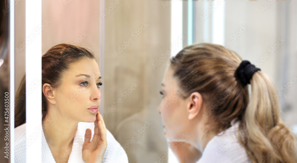 Magic anti-aging cream.Applying the cream.