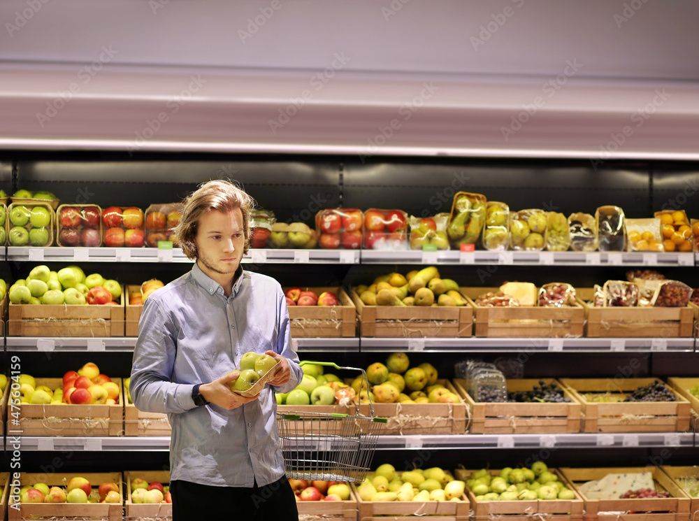 Man buying fruits at the market