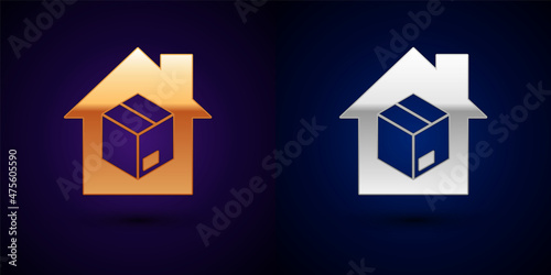 Gold and silver Home delivery services icon isolated on black background. Vector