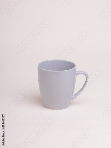 gray ceramic coffee mug on a light background