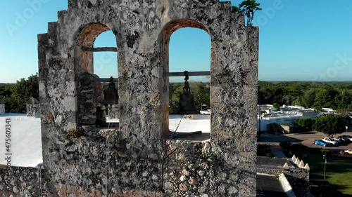 The bell of Convent de San Bernardino de Siena, an important historic landmark of Valladolid, a colonial town in Yucatan Peninsula, Mexico. Aerial shot. High quality 4k footage photo