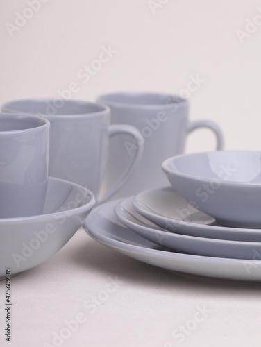 Wallpaper Mural set of gray ceramic dishes on a light background Torontodigital.ca