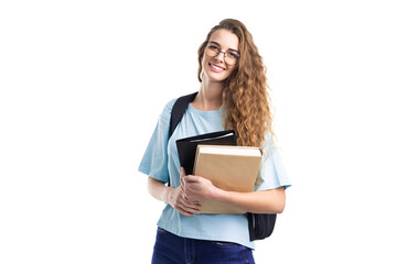 Young smiling student woman holds books while looking at camera. Over white background. Education.