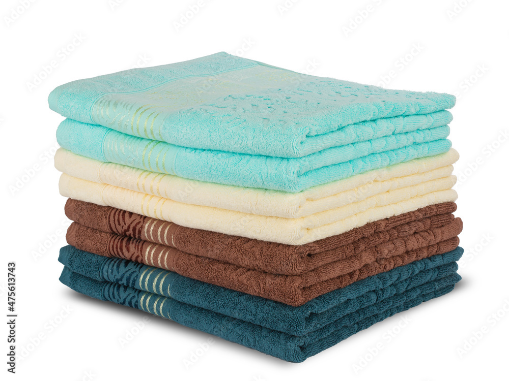 multi-colored Terry cotton bath towels, isolate on a white background multi-colored Terry cotton bath towels, isolate on a white background