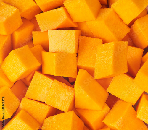 Fotografie textured diced butternut squash close up.
