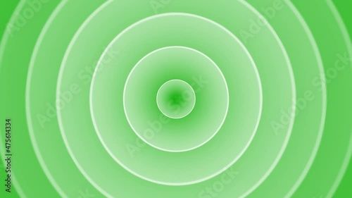 An illustration of moving circles on a green screeb photo