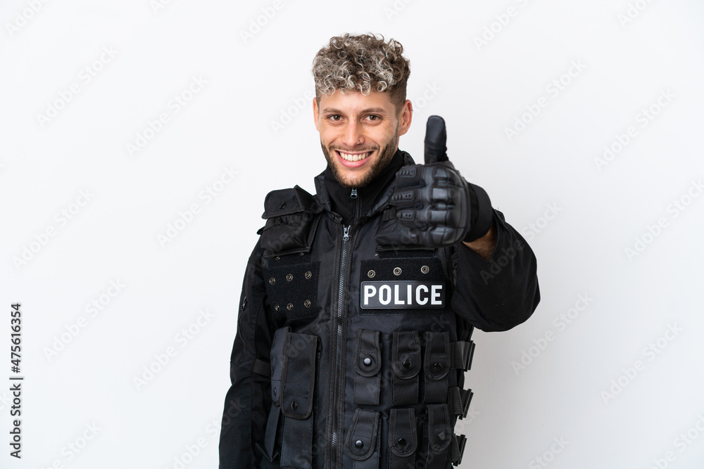 SWAT caucasian man isolated on white background with thumbs up because something good has happened SWAT caucasian man isolated on white background with thumbs up because something good has happened