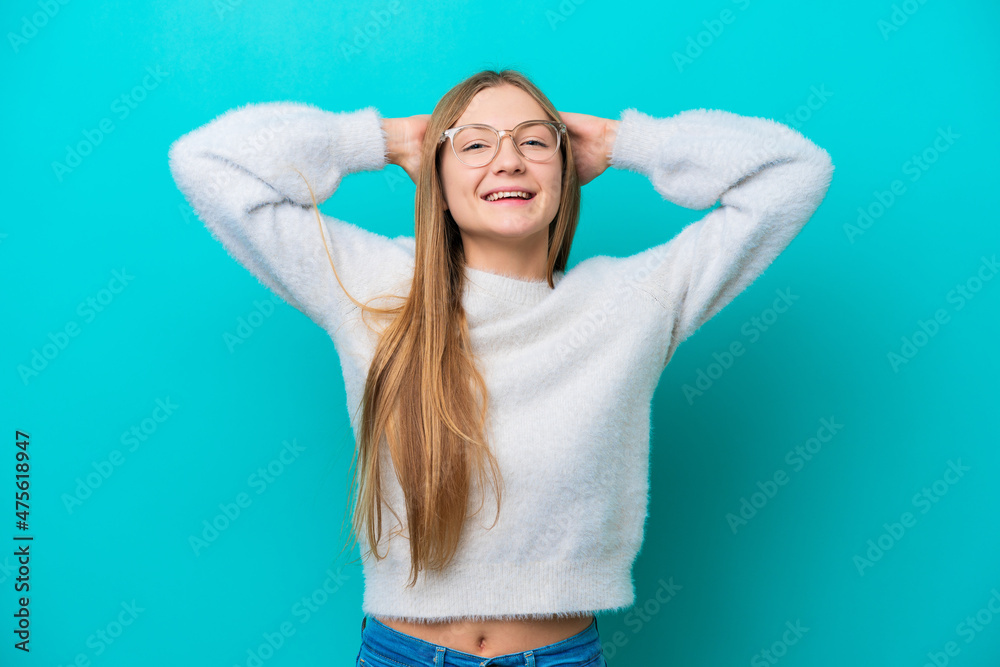 Young Russian woman isolated on blue background laughing Young Russian woman isolated on blue background laughing