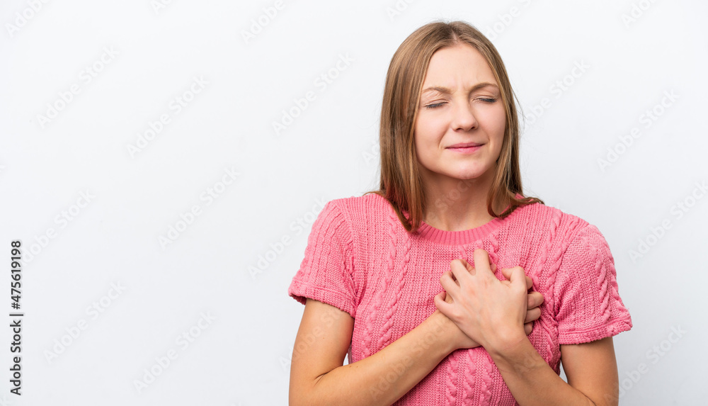 Young Russian woman isolated on white background having a pain in the heart Young Russian woman isolated on white background having a pain in the heart