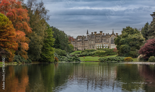 Beautiful view of the colorful trees under the stormy sky in the Sheffield Park photo