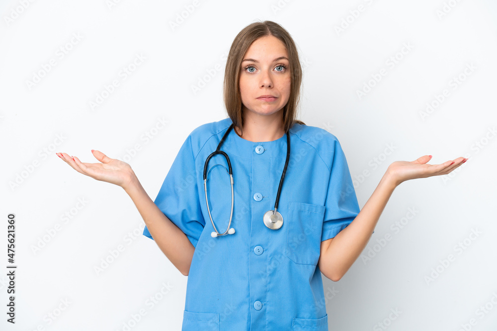 Young surgeon doctor Lithuanian woman isolated on white background having doubts while raising hands Young surgeon doctor Lithuanian woman isolated on white background having doubts while raising hands