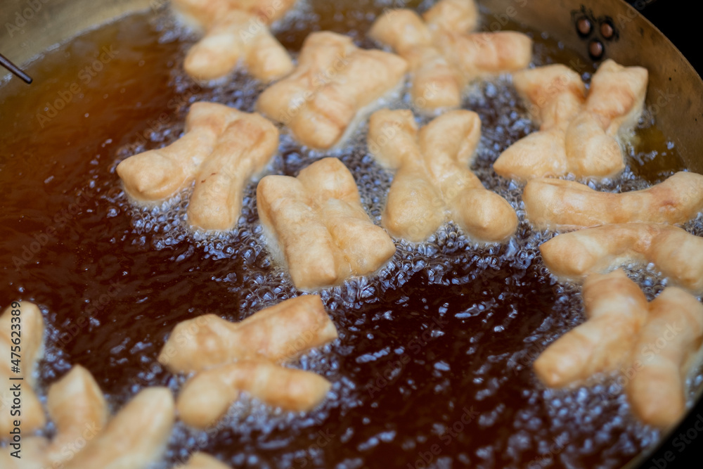 closeup make Youtiao, deep-fried doughstick, Patongo closeup make Youtiao, deep-fried doughstick, Patongo