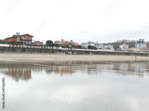 Buildings on the coastline on a gloomy day photo