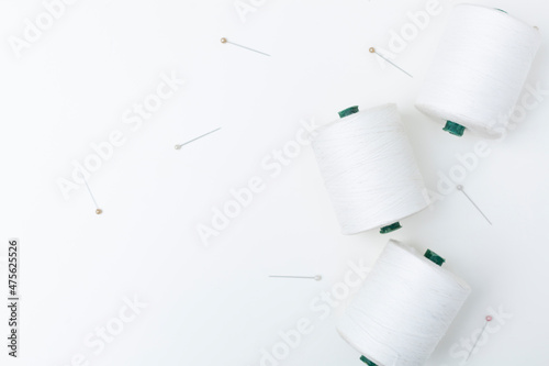 Wallpaper Mural White cotton skeins of thread with pins isolated on white background. Torontodigital.ca