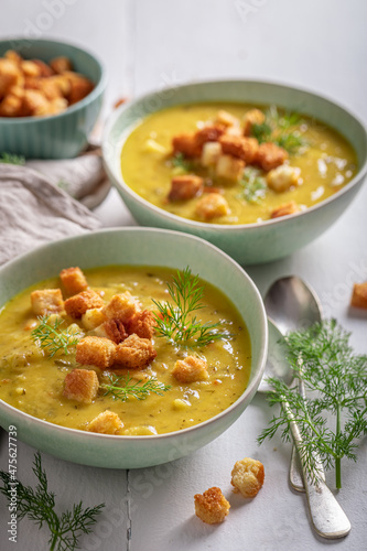 Sour gherkins soup served with croutons and cream.