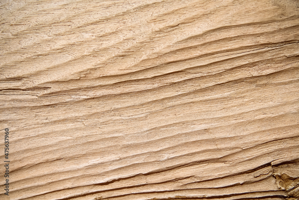 Wood skin with natural line wave patterns for light brown background Wood skin with natural line wave patterns for light brown background