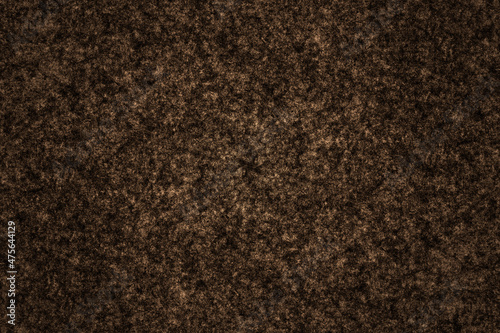 Distressed soft brown color metal surface with scattered heavy grunge textures for background