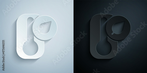 Paper cut Meteorology thermometer measuring heat and cold icon isolated on grey and black background. Thermometer equipment showing hot or cold weather. Paper art style. Vector
