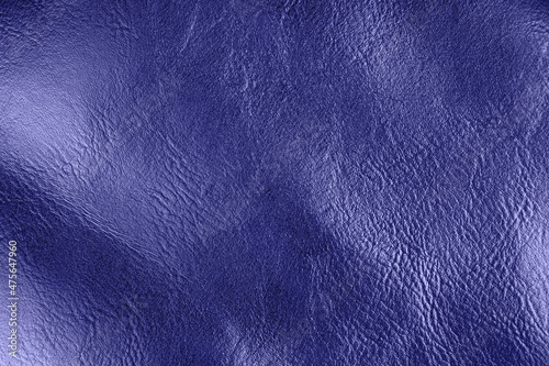 Natural textured leather background. Toned in trendy Color Of The Year 2022 - Very Peri.