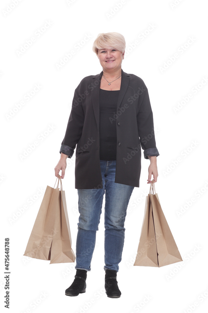 full-length. casual mature woman with shopping bags . full-length. casual mature woman with shopping bags .