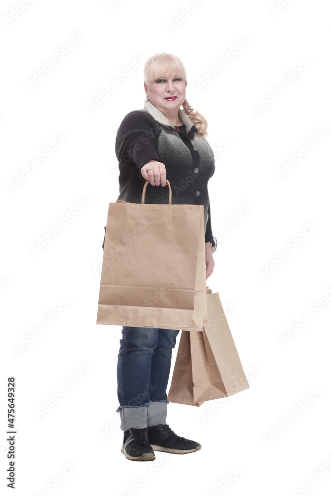 full-length. casual woman in jeans with shopping bags. full-length. casual woman in jeans with shopping bags.