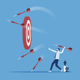 businessman throw many dart arrow hit out of the dartboard, missing the marketing target and customer,fail on company mission and goal