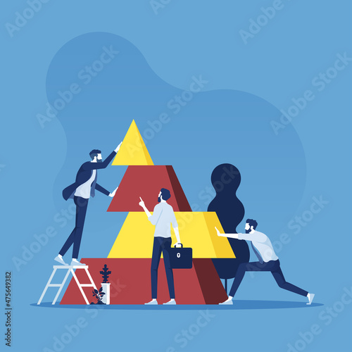 The business team connect the elements of the pyramid, symbol of teamwork, and partnership concept