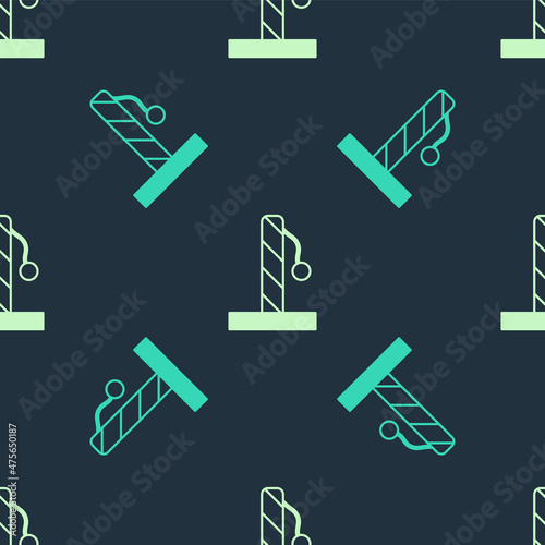 Green and beige Cat scratching post with toy icon isolated seamless pattern on blue background. Vector