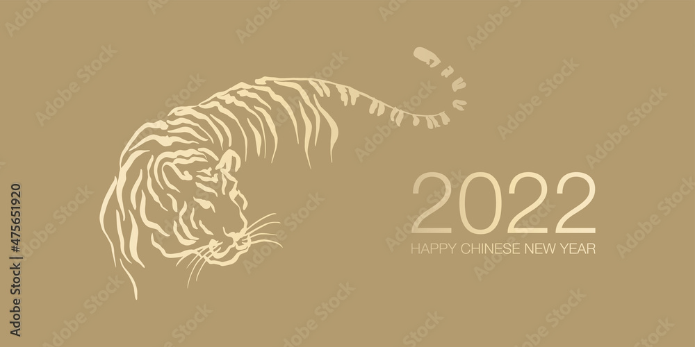 Happy Chinese New Year 2022 by gold brush stroke abstract paint of the tiger isolated on golden background.