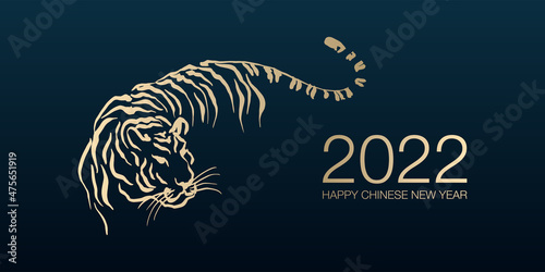 Fotografia Happy Chinese New Year 2022 by gold brush stroke abstract paint of the tiger isolated on dark blue background