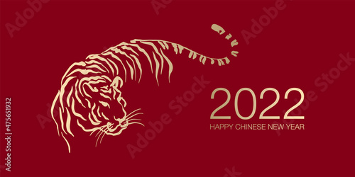 Happy Chinese New Year 2022 by gold brush stroke abstract paint of the tiger isolated on red background.