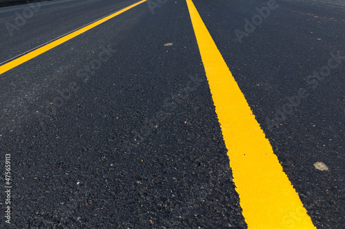 Asphalt road as abstract background