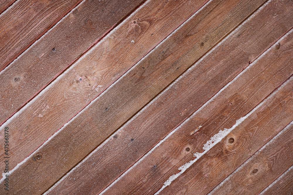background of brown boards at an angle of 45 degrees covered with frost background of brown boards at an angle of 45 degrees covered with frost
