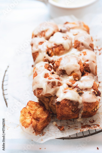 Monkey yeast bread with cinnamon and pecans, vanilla icing