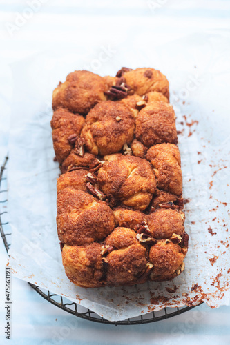 Monkey yeast bread with cinnamon and pecans, vanilla icing