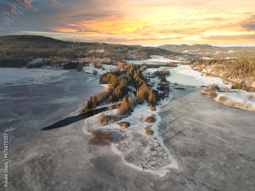 Sunrise over Oslo, Norway. Shot just outside of the city a winter morning in December. Shot high up in the sky with a drone. DJI Mavic 3
