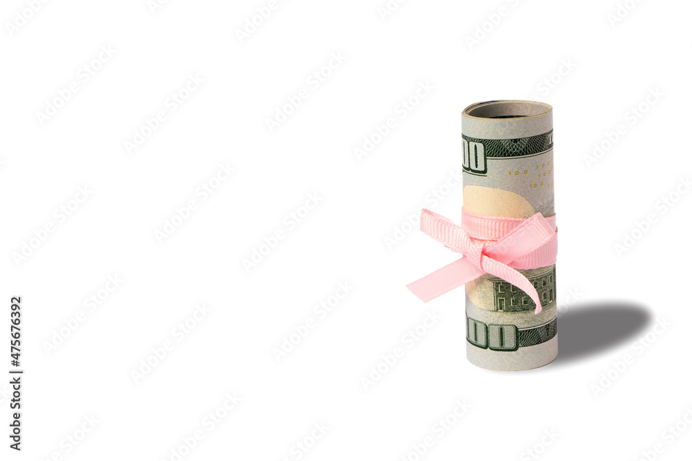 Dollar bills tied by pink ribbon isolated on white background with copy space. Dollar bills tied by pink ribbon isolated on white background with copy space.