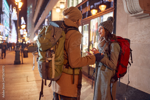 couple on a walk in a city in winter.Christmas, winter holidays, vacation, New Year photo