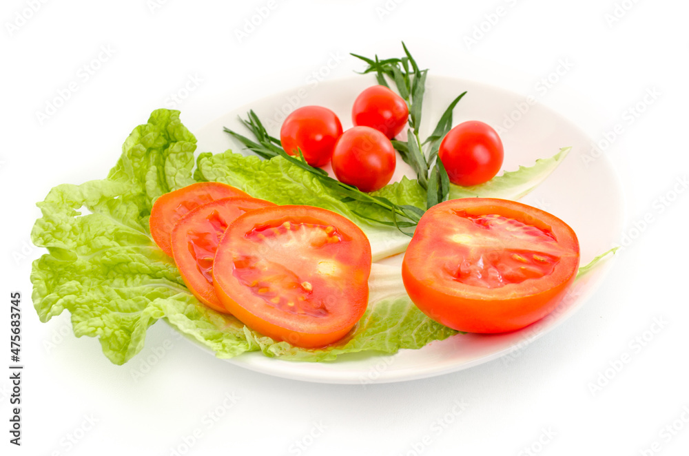 Lettuce and tomatoes isolated on white background Lettuce and tomatoes isolated on white background